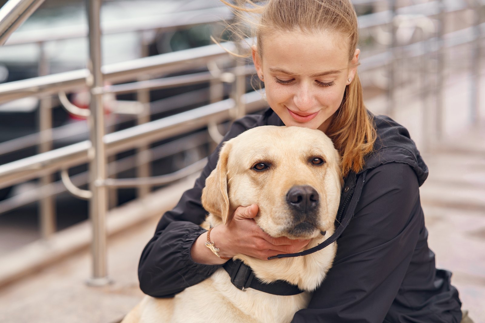 Portrait of a woman with her beautiful dog