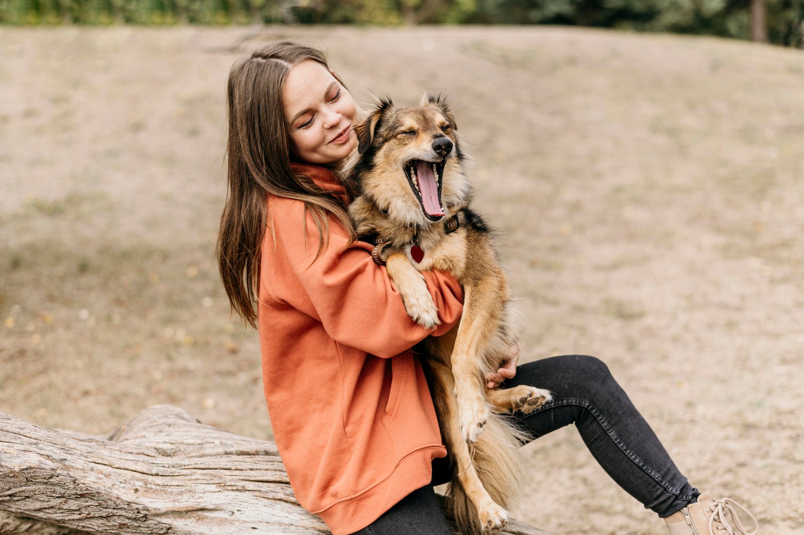 pretty-young-woman-petting-her-dog